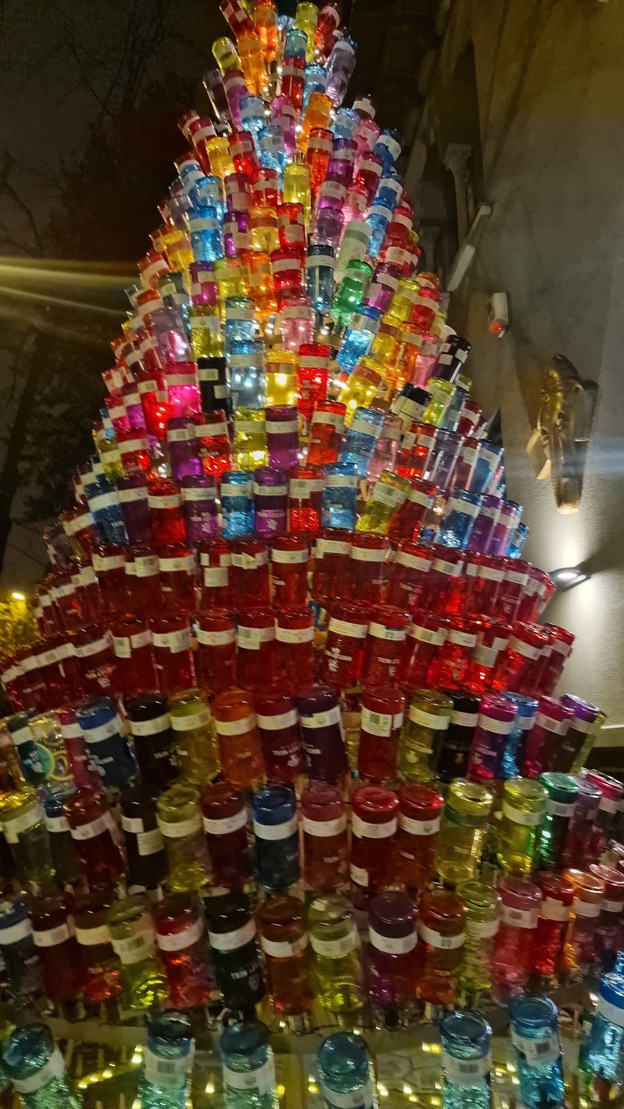 Filled with bottles, lit from inside